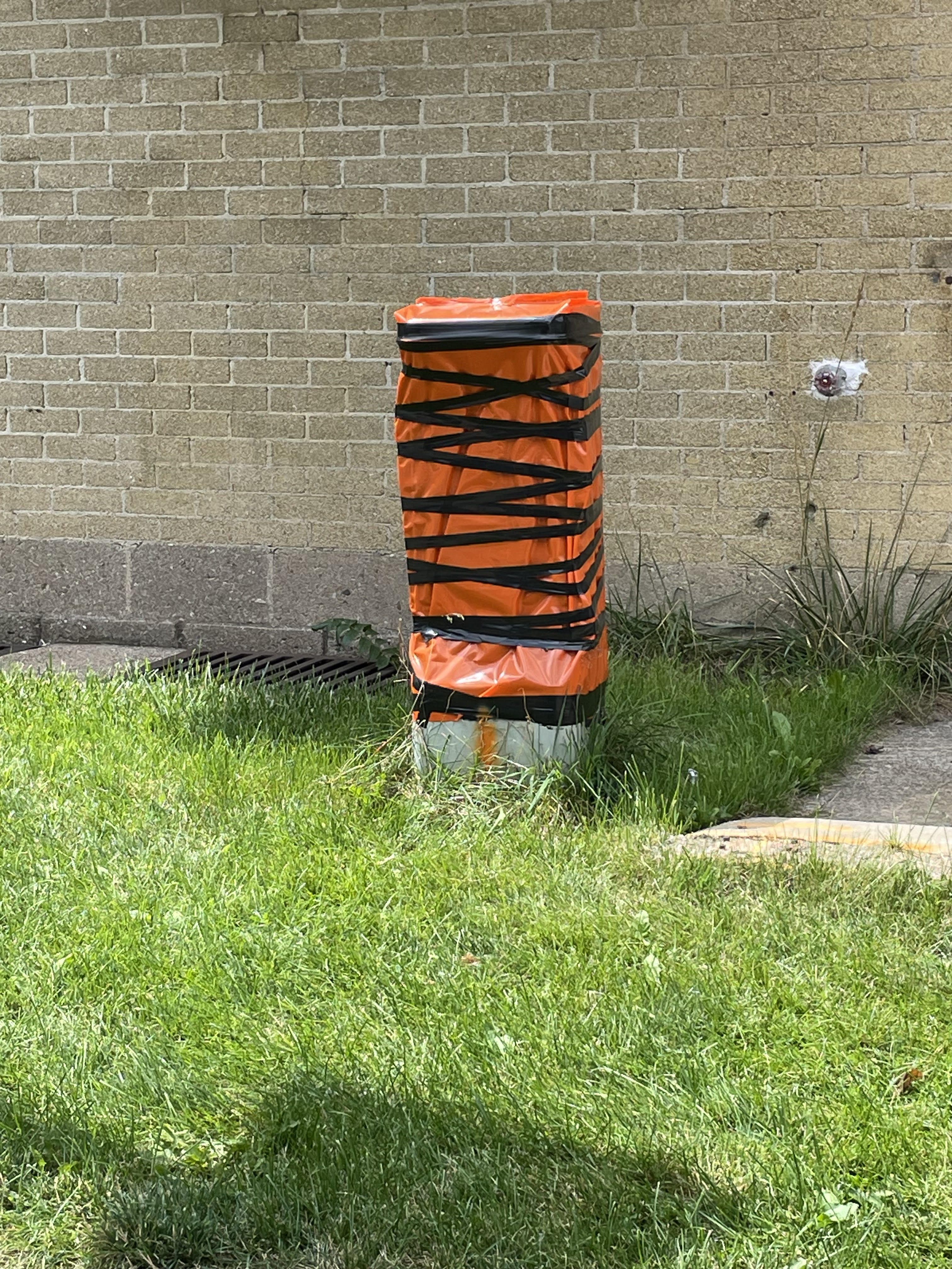 15_McPhailorangepostwithblacktape